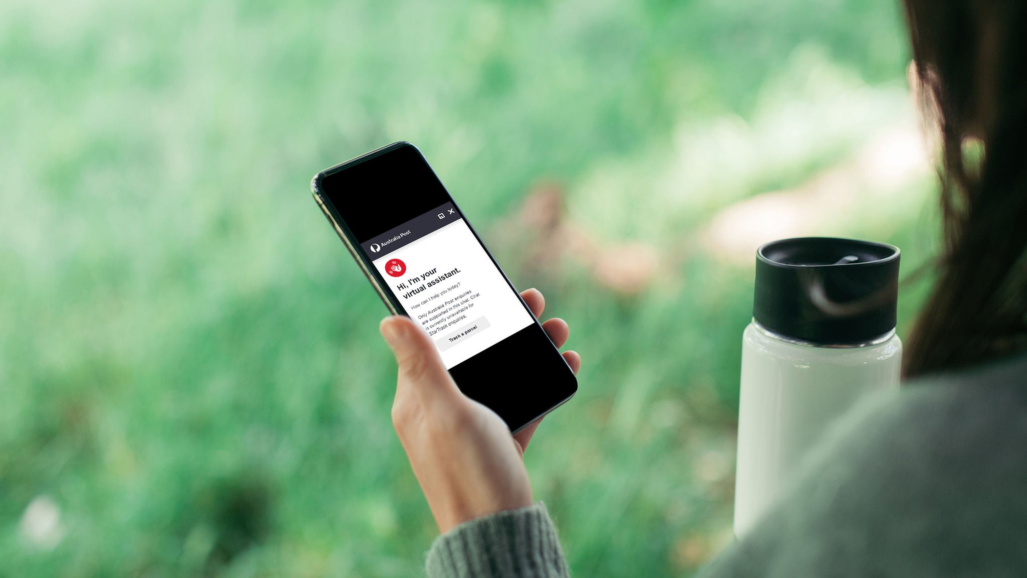 photo-woman-looking-at-phone-virtual-assistant