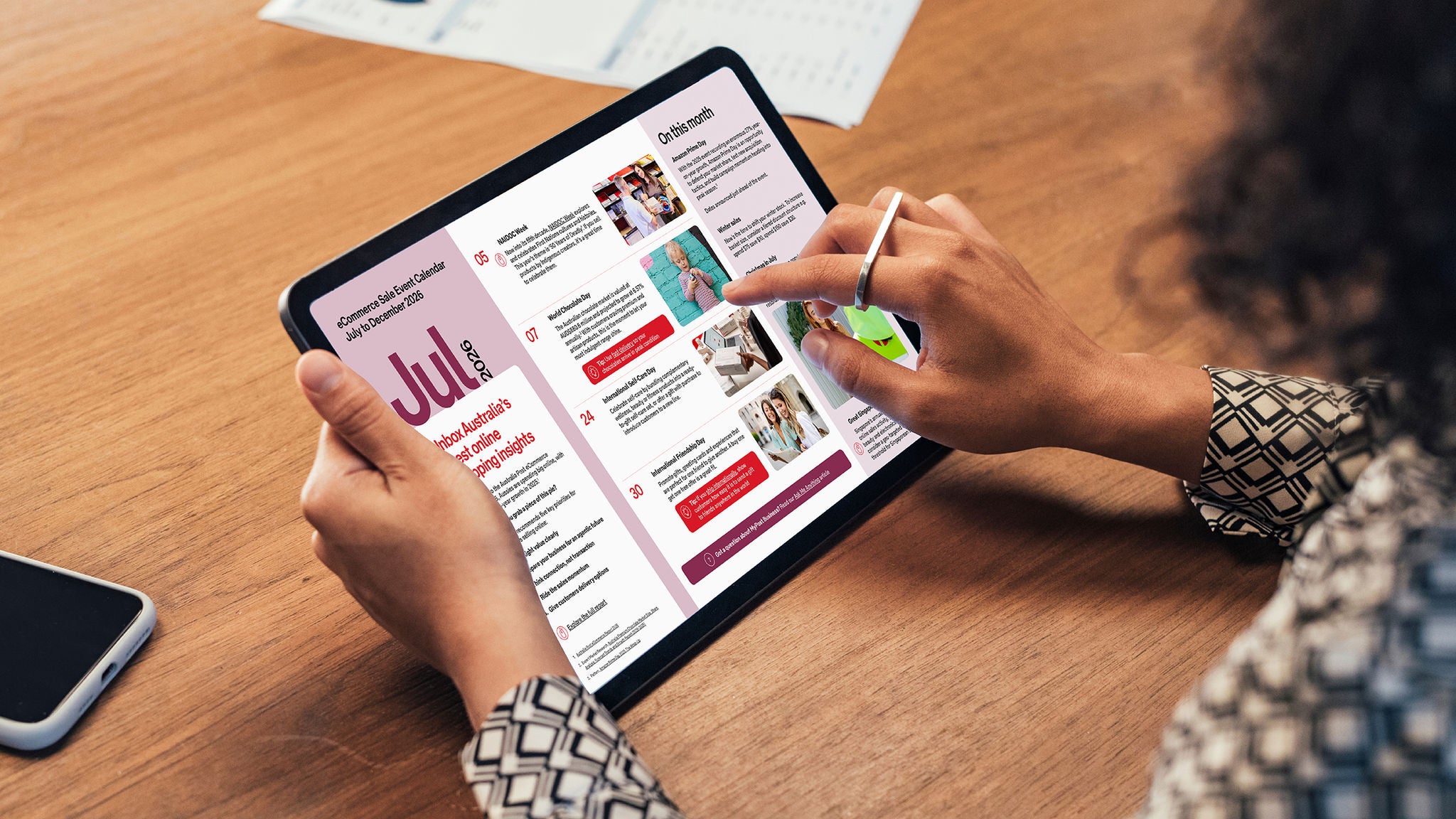 Woman reading digital newsletter on tablet