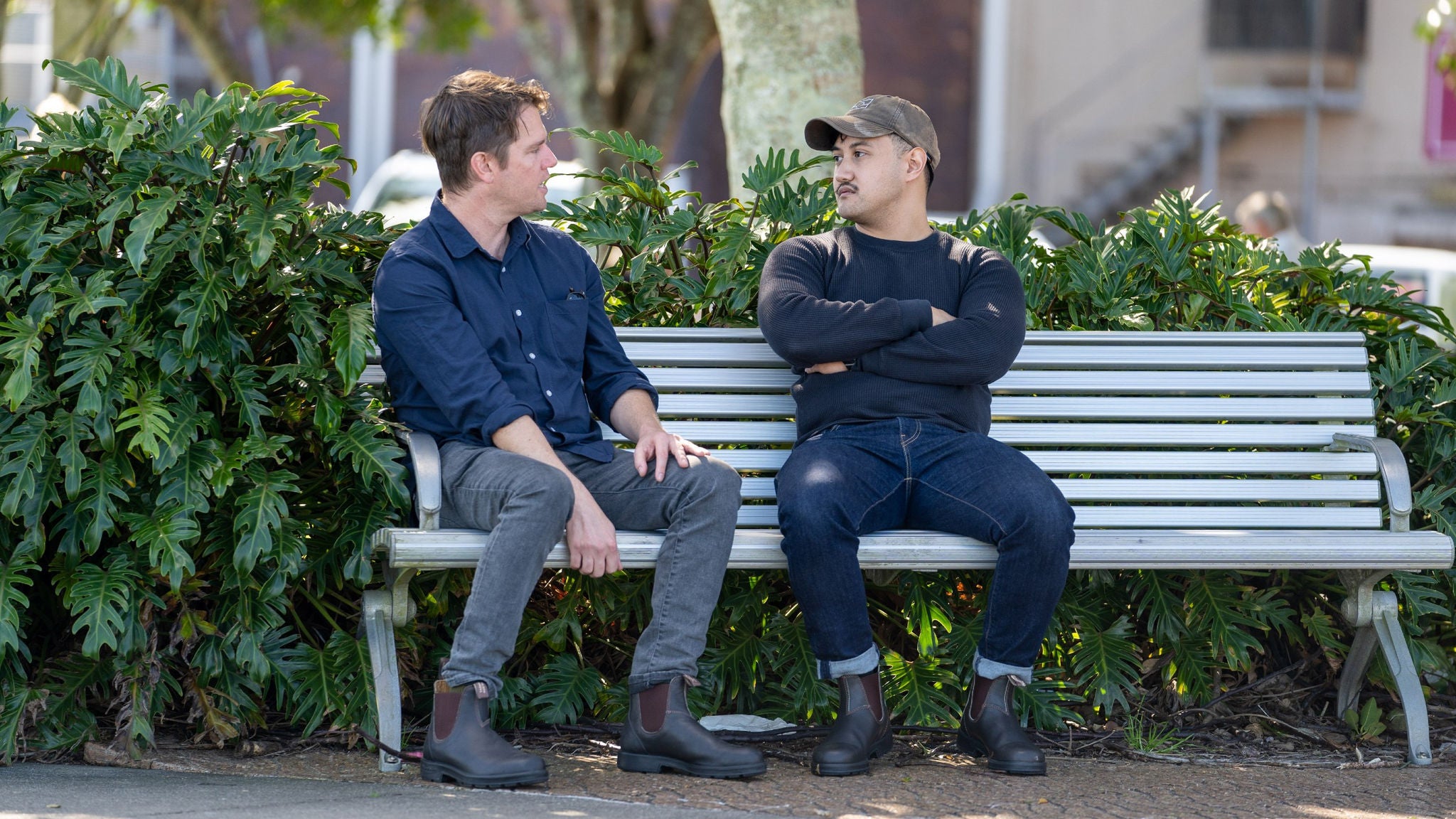 james-wallace-chatting-with-man-on-park-bench